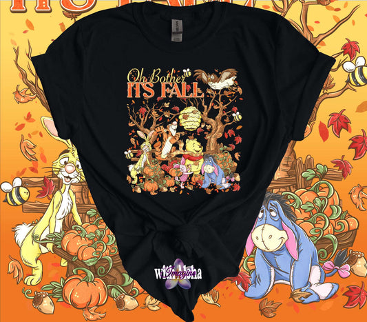 Pooh Bear Halloween T-Shirt featuring autumn-themed design with Pooh and friends surrounded by fall foliage and pumpkins.