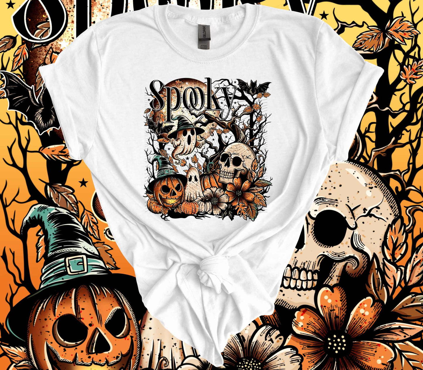 Spooky Skulls 100% Cotton Halloween T-Shirt featuring a ghost, skulls, and pumpkins in a haunting design on a white background